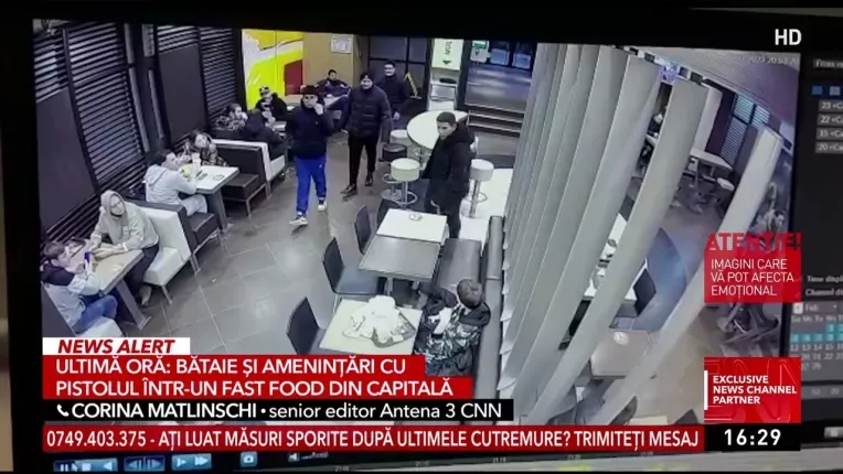 Scandal cu bataie si amenintari cu pistolul intr-un fast food din Bucuresti.